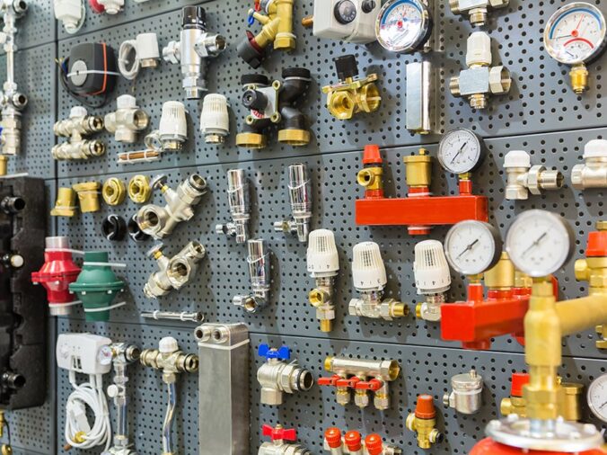 plumbing fixtures, guages and connectoes in a plumbing supply store