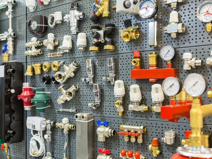 plumbing fixtures, guages and connectoes in a plumbing supply store