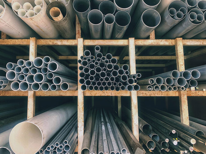 PVC pipes in shelves in a plumbing supply warehouse